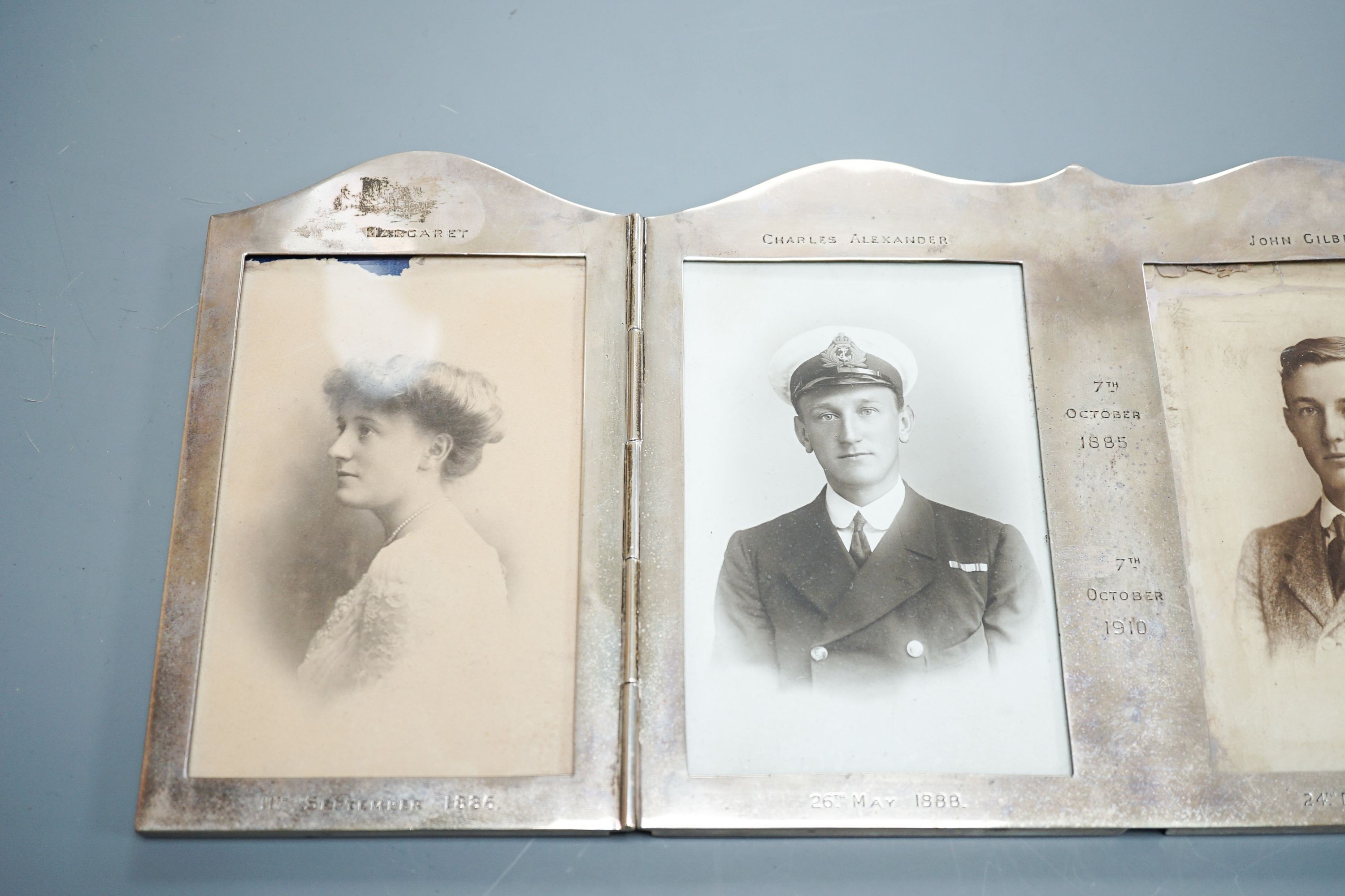 A George V silver folding four-division photograph frame, Daniel & John Welby, London, 1910, width 44.6cm